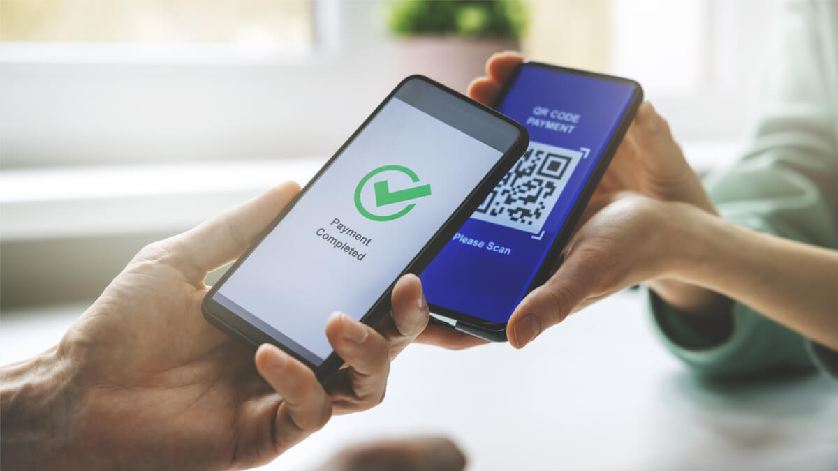 Vibrant busy retail shop counter with customer smartphone scanning USDT QR code for low-fee crypto payment in brick-and-mortar store
